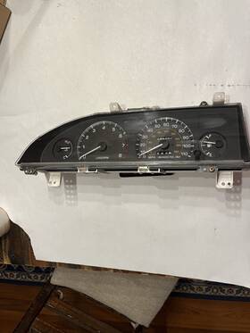 8320025770 Toyota 1988-1989 Corolla 4dr Gauge Cluster Tach Speedometer Panel 171 397 Oem