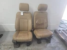 2011-2016 Ford F250/350SD Tan Leather Front Bucket Seat Pair (drv/pass). Fixed Price $995.00.
